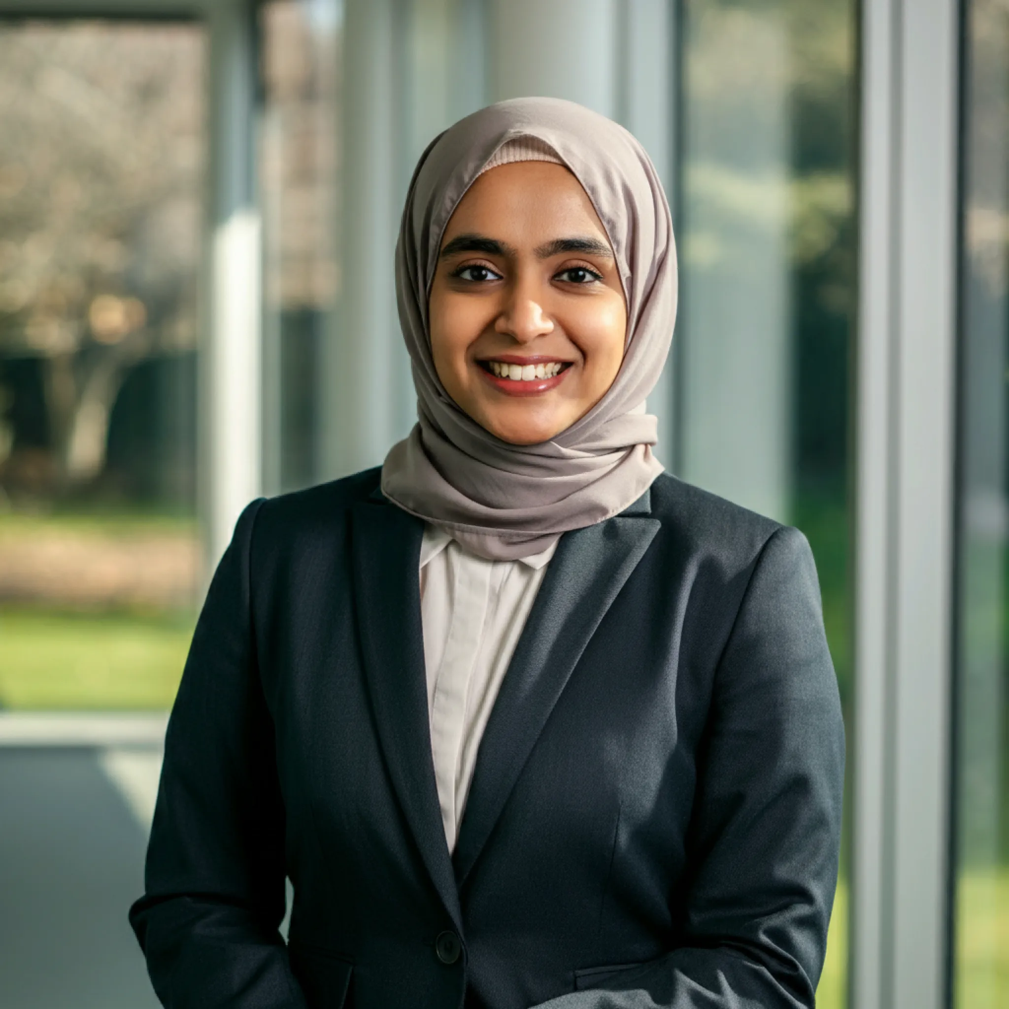 Businesswoman in hijab standing in an office
